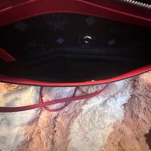 MCM Black Leather Crossbody bag.